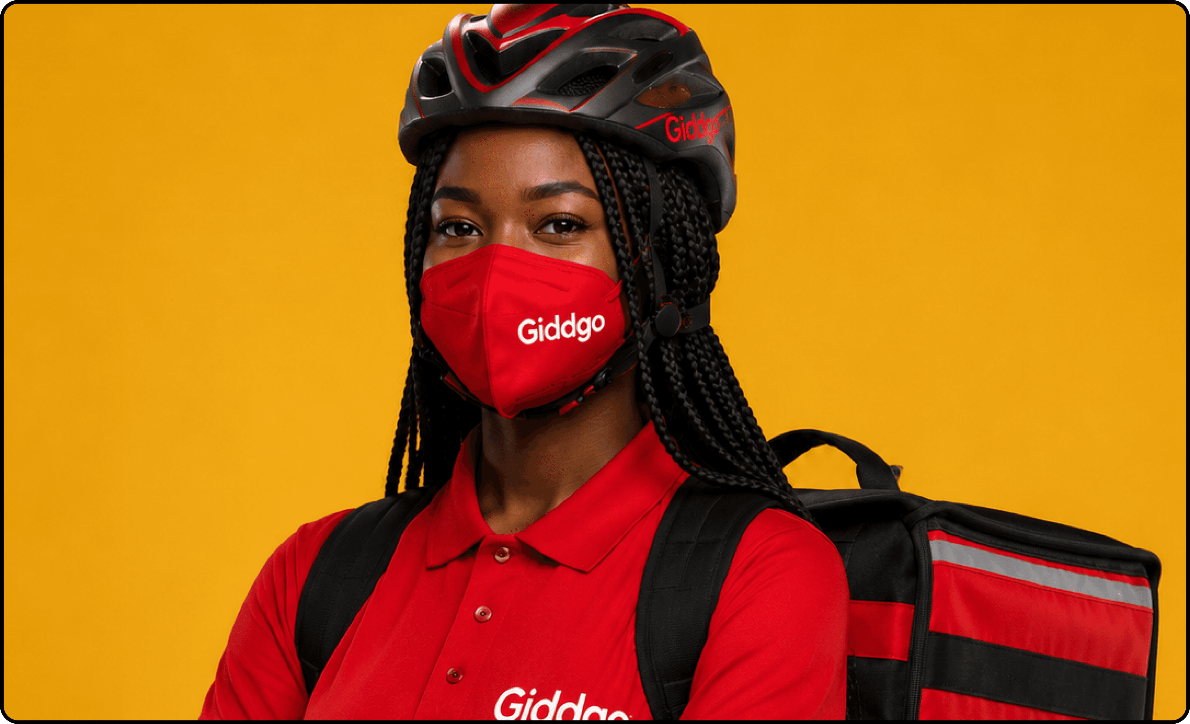 A Giddgo rider wearing branded gear and a delivery backpack